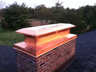 Before and after chimney cap replacement in Baldwin, NY