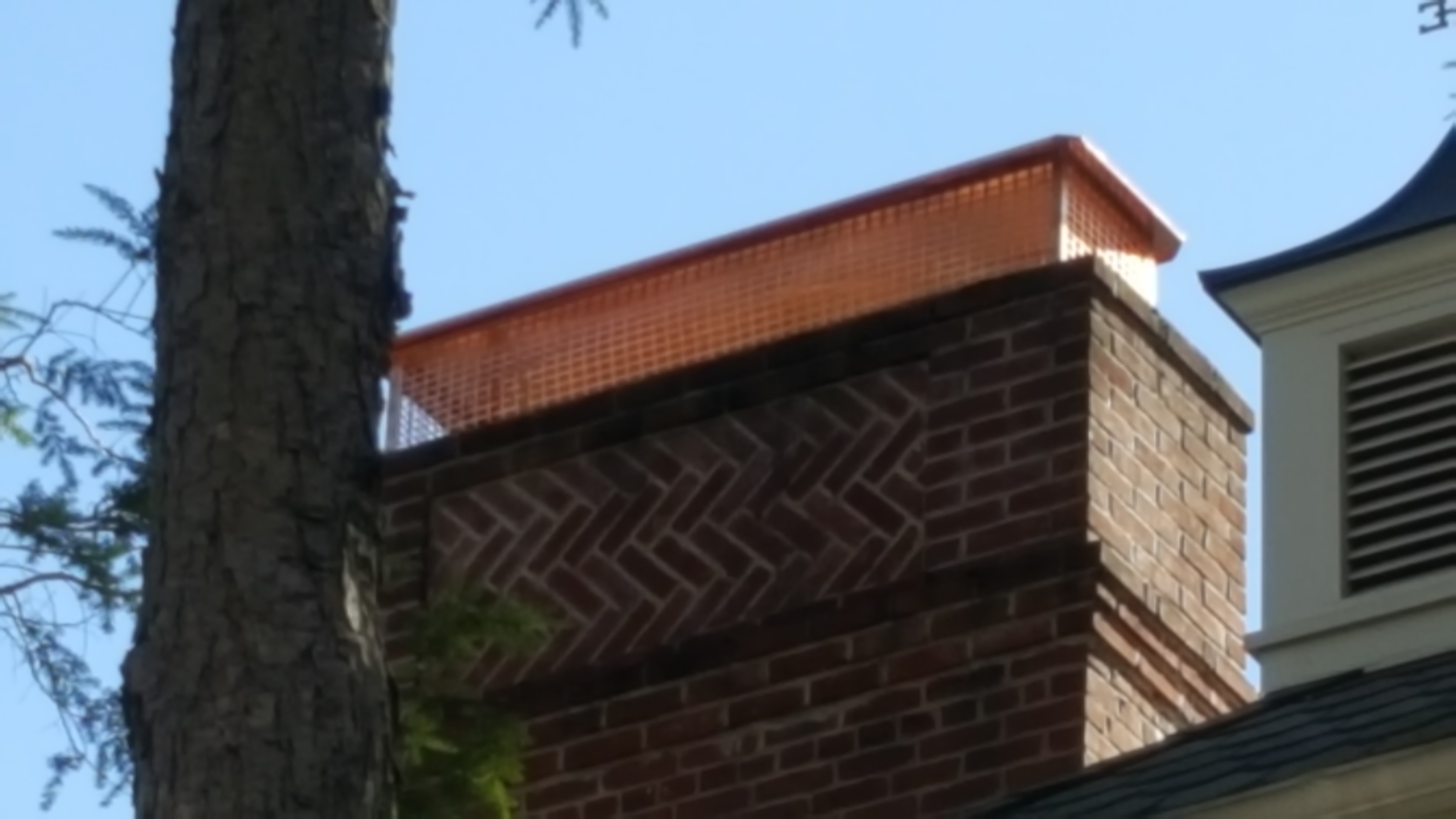 New stainless steel chimney cap installed in Baldwin, NY