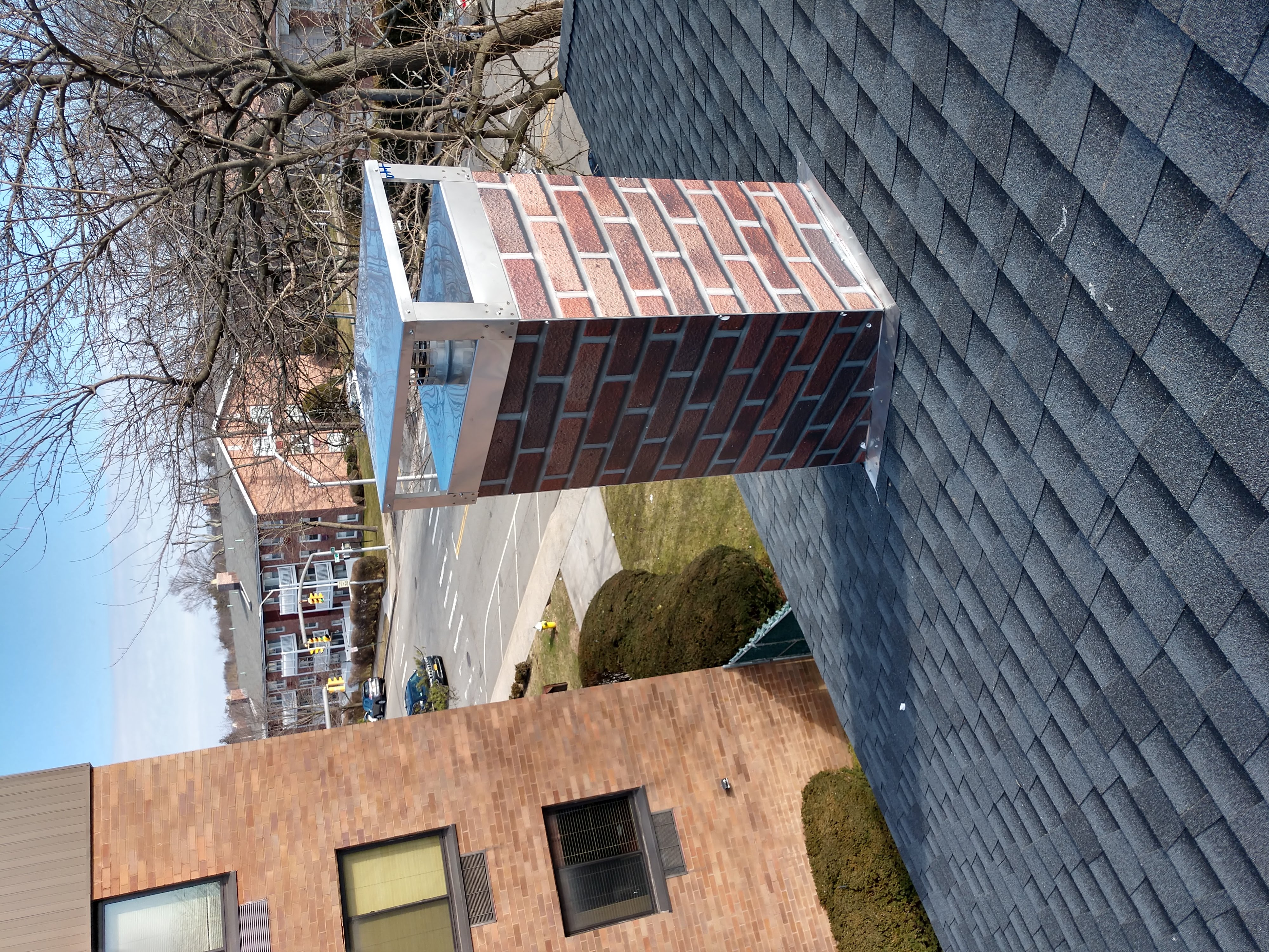 New elastomeric sealant applied to chimney crown in Baldwin, NY