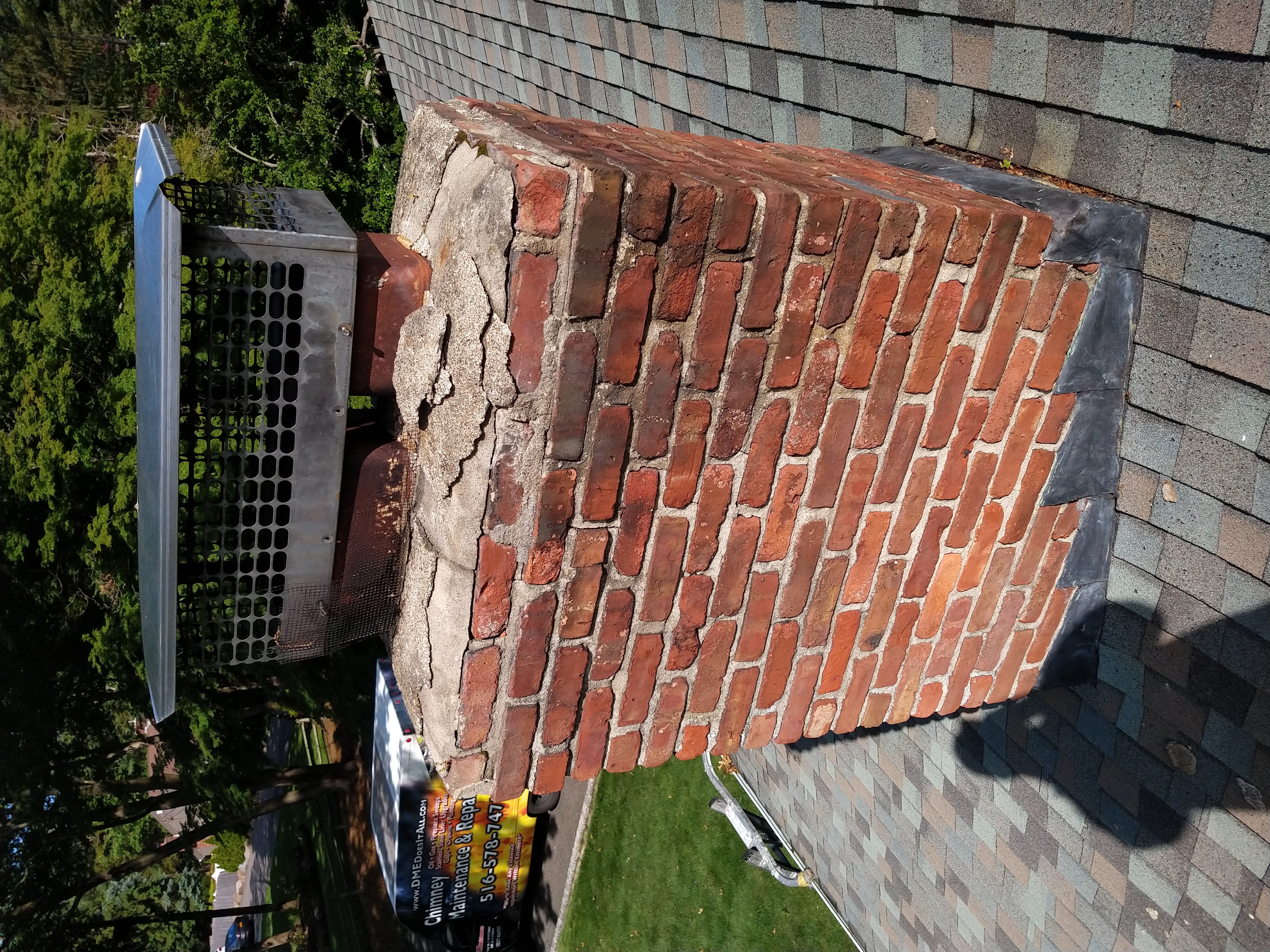 Cracked chimney crown professionally repaired in Baldwin, New York